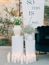 White Round Pillar Stands Set of 5 $210.00